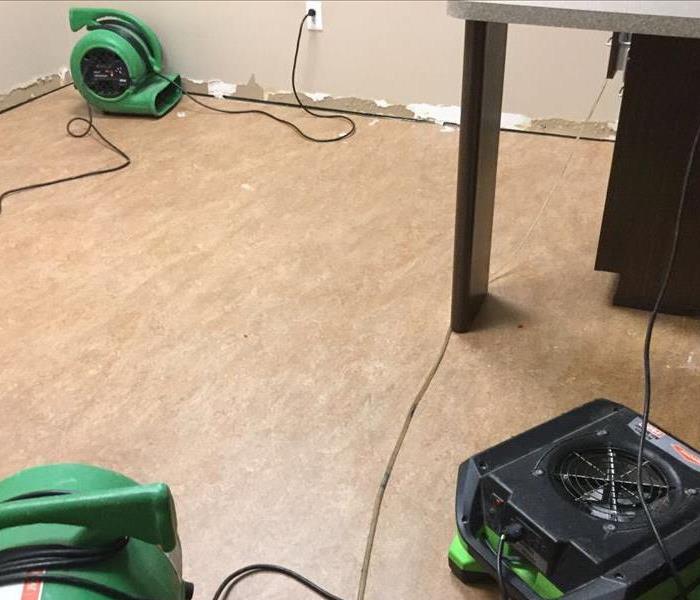 Water damage to large office we have placed air movers for drying