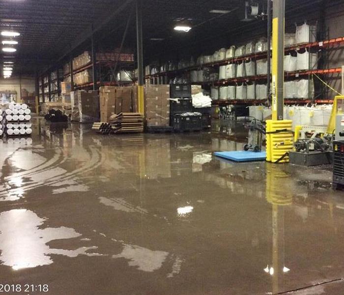 Large Water Damage to concrete flooring